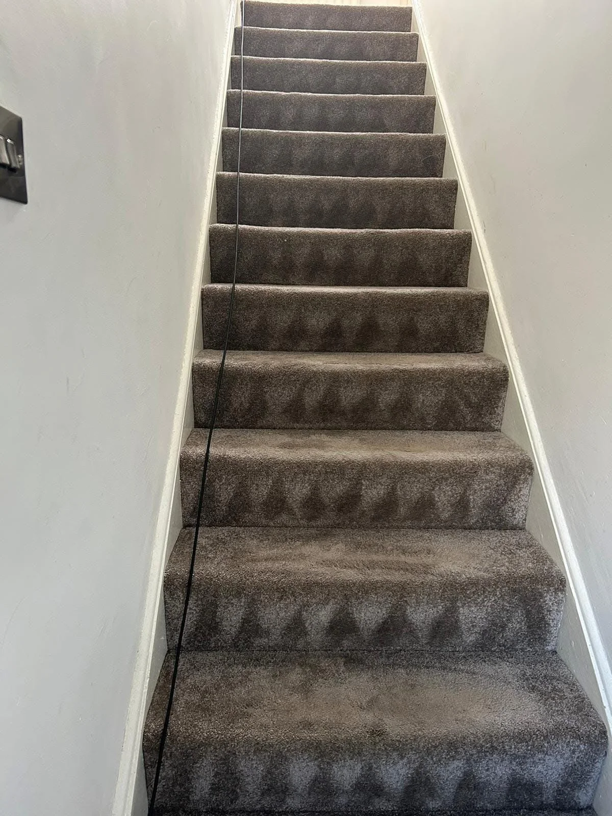 Vacuumed carpeted staircase